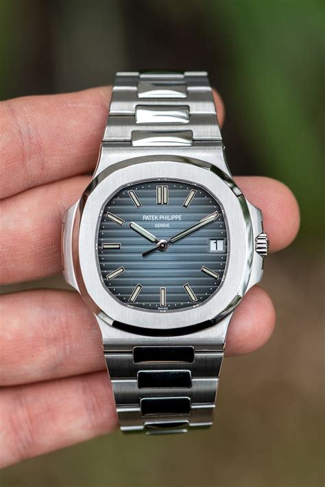 silver patek philippe with blue face|Patek Philippe nautilus blue.